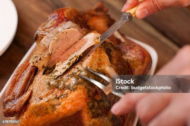 Carving A Tasty Thanksgiving Roast Turkey Stock Photo - Download Image Now - Carving - Craft Activity, Carving Food, Turkey - Bird