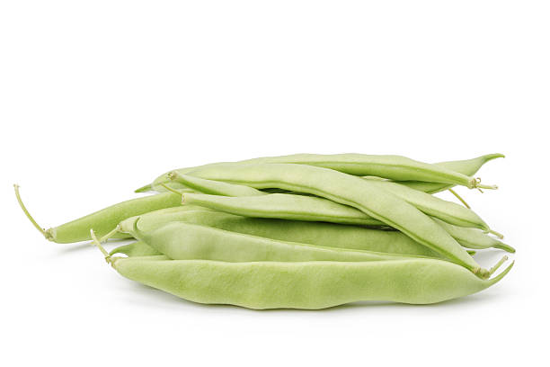 heap of green beans in pod isolated heap of green beans in pod isolated on a white background fabes stock pictures, royalty-free photos & images