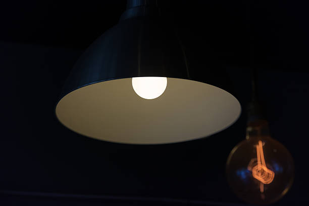 istock Hanged lamp in the dark room 478795034