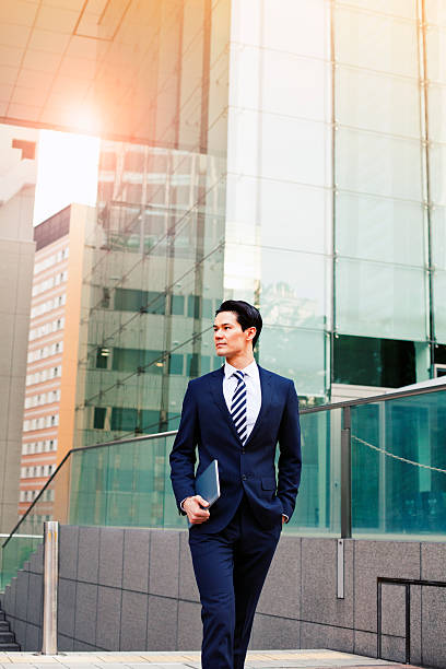 istock Japanese businessman with digital tablet, Tokyo. 478795130