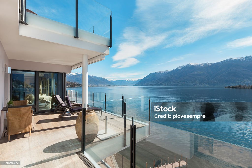 terrace of a building, beautiful landscape modern architecture, beautiful lake view from the terrace of a penthouse Lake Stock Photo