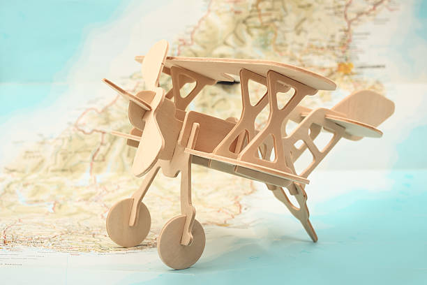istock Fly away travel concept with airplane on map 478797922