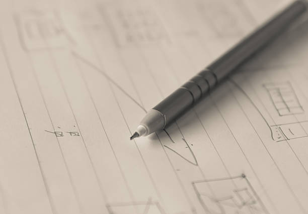 istock Pen put  on written paper for business model drawing 478797970