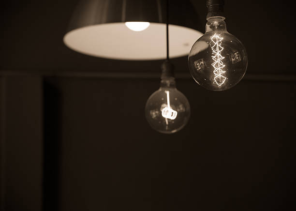istock Hanged lamps   in dark room 478797974