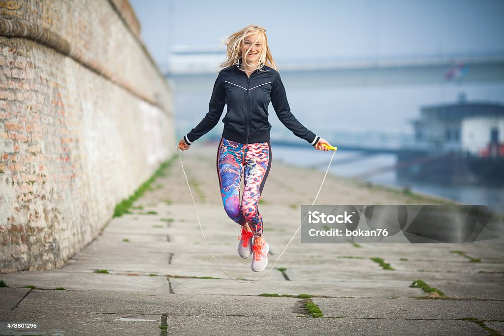 Jump Rope Exercise Woman exercising outdoors with a jump rope Jumping Rope Stock Photo