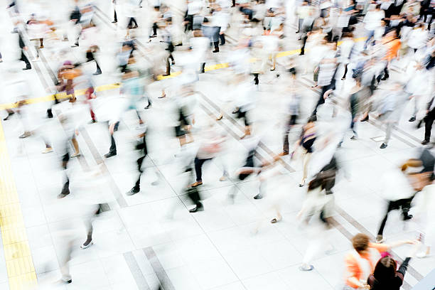 istock Motion blurred crowded pedestrian walkway, business people, Tokyo 478804088