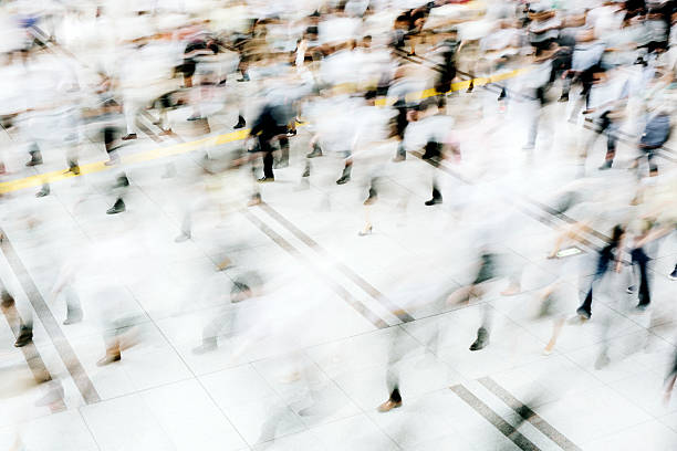 istock Motion blurred crowded pedestrian walkway, business people, Tokyo 478804090