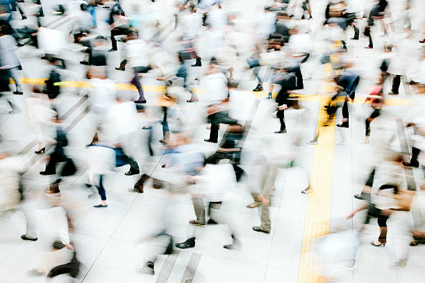 istock Motion blurred crowded pedestrian walkway, business people, Tokyo 478804108