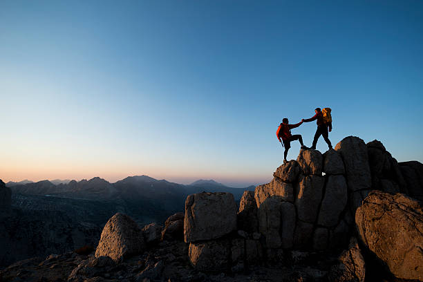 stepping up - outdoors exercising climbing motivation стоковые фото и изображения