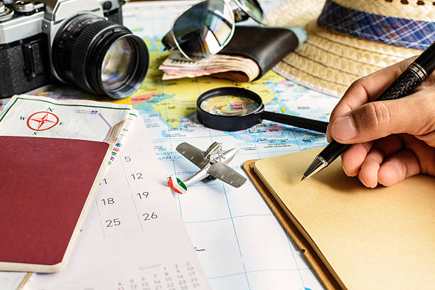 istock diary and calendar with passport and map 478806766