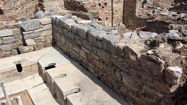 cidade antiga de éfeso - toilet public restroom ephesus history imagens e fotografias de stock
