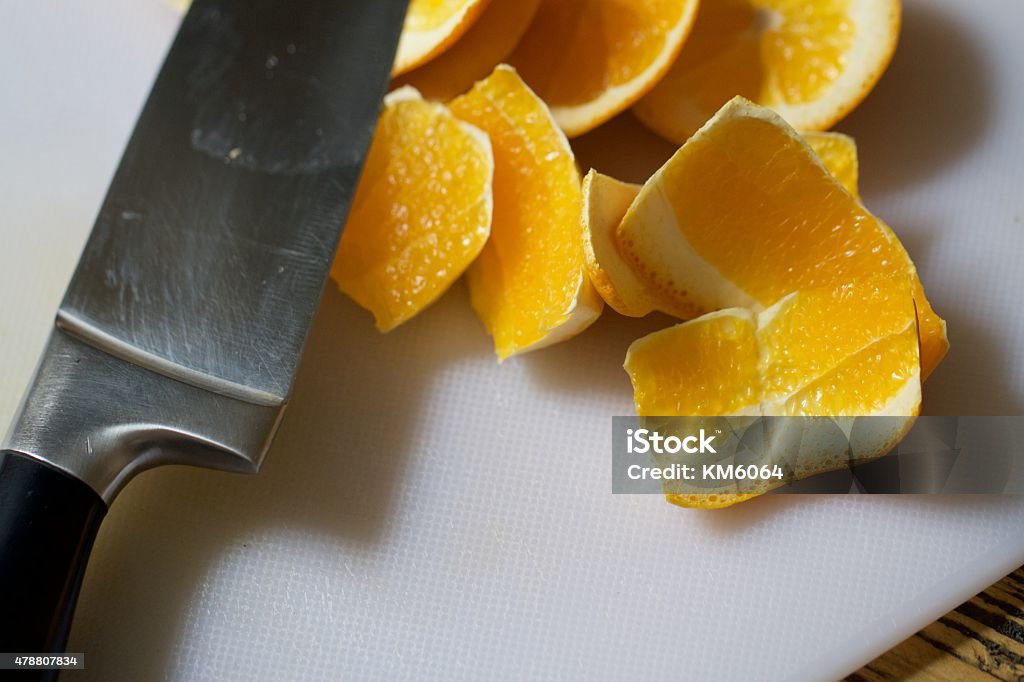 Sliced Oranges Slicing and peeling fresh oranges 2015 Stock Photo