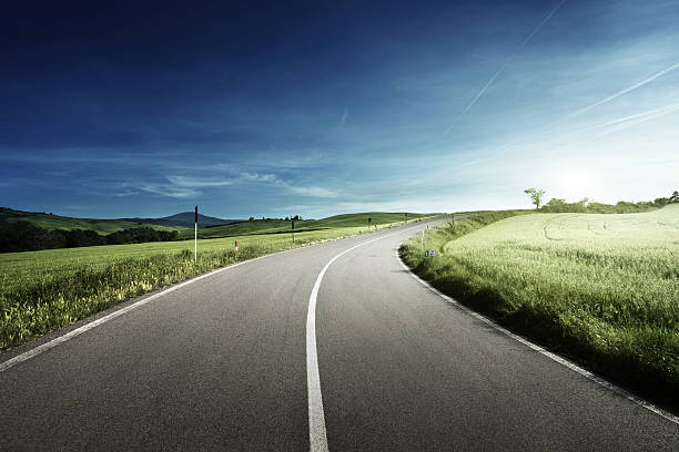 asphalt road in Tuscany, Italy