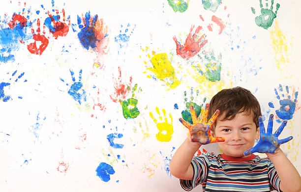 istock Happy child with painted hands 478812310