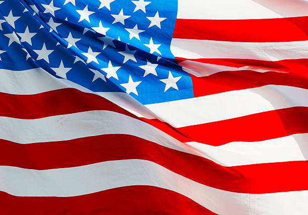 istock American flag in the wind in sunshine 478812692