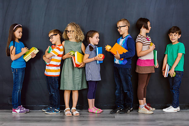 istock School boys and girls 478815440