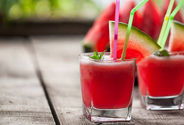 istock Watermelon juice with sliced fruit 478817114
