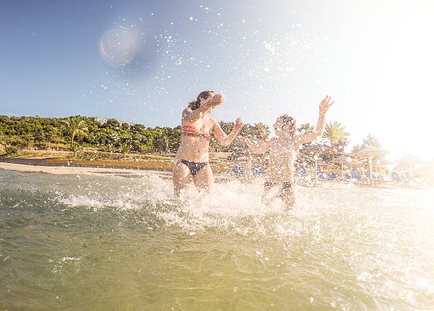 istock Mother and son having fun on sea 478819974