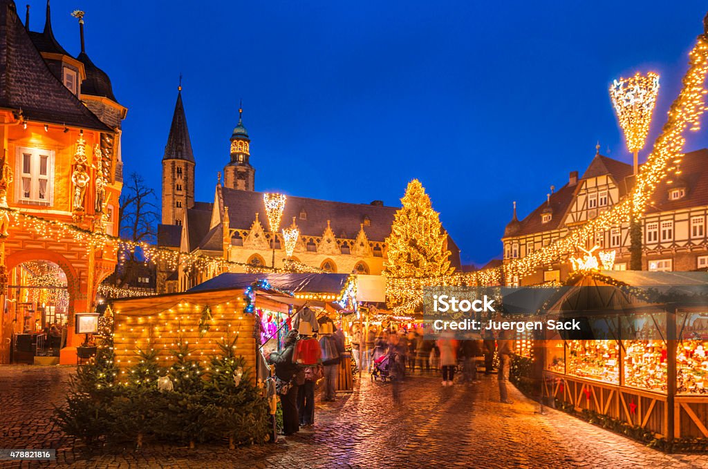 Christmas Market Goslar The traditional Christmas Market on the historic Market Square of Goslar, Germany at dusk.  Christmas Market Stock Photo
