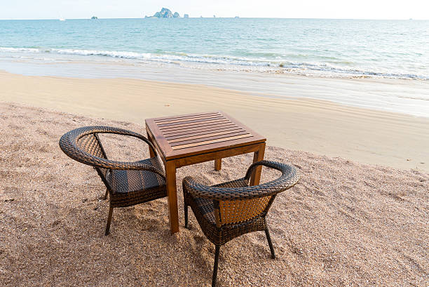 istock dinner table at the beach for couple 478822008