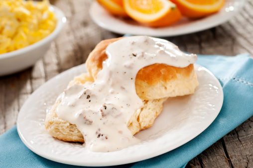 Biscuit and gravy with eggs and fruit.  Please see my portfolio for other food and drink images.