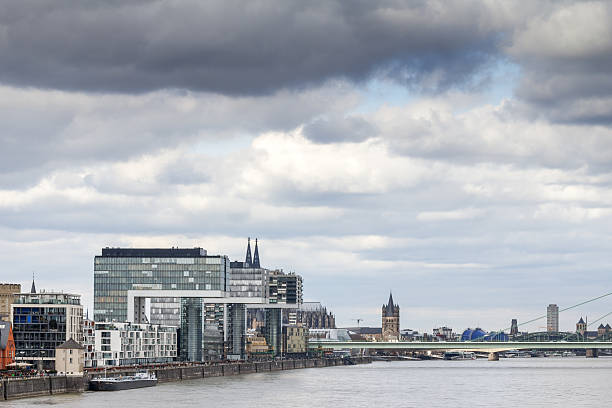 istock cologne rhine buildings view 478824617