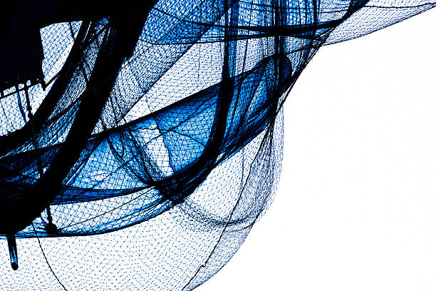 Old damaged safety net against white background, full frame horizontal composition with copy space, abstract background