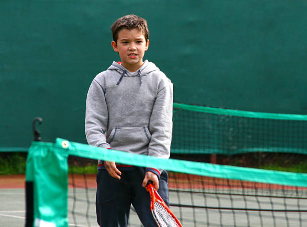 istock Little tennis player 478826327