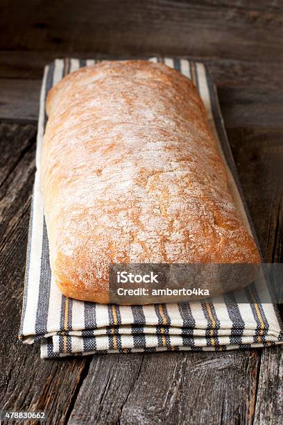 Fresh Bread On The Wooden Table Stock Photo - Download Image Now - 2015, Agriculture, Baguette