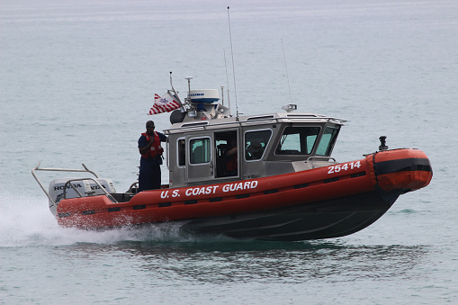 Evanston, Illinois, United States - June 13, 2015:  A Coast Guard boat patrols the waters of Lake Michigan near Evanston, Illinois.