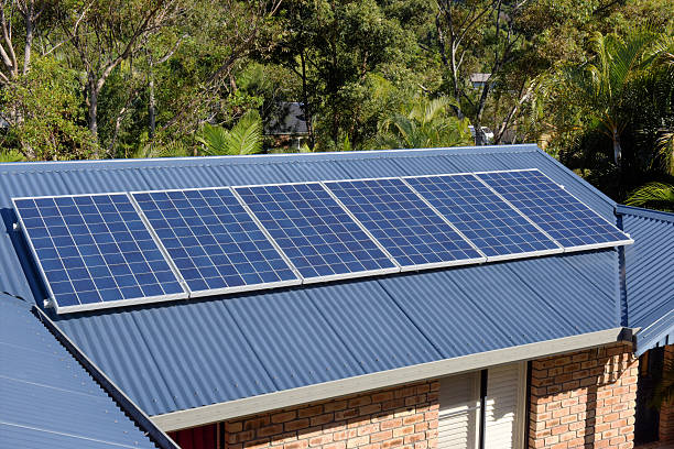 istock Row of solar panels on a house roof 478834230