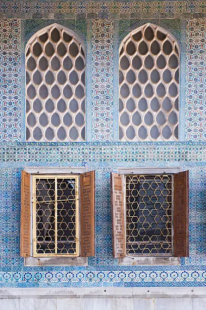 Windows and decorative blue tile at the Topkapi Palace Harem in Istanbul, Turkey
