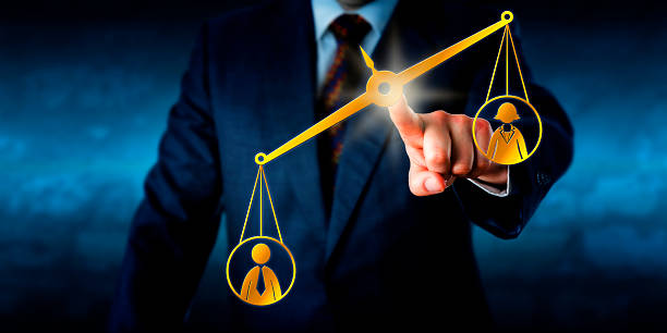 istock Male Worker Outbalancing A Female White Collar 478835106