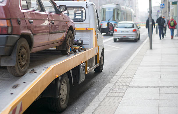 L'assistance routière voiture camion de remorquage de la ville - Photo