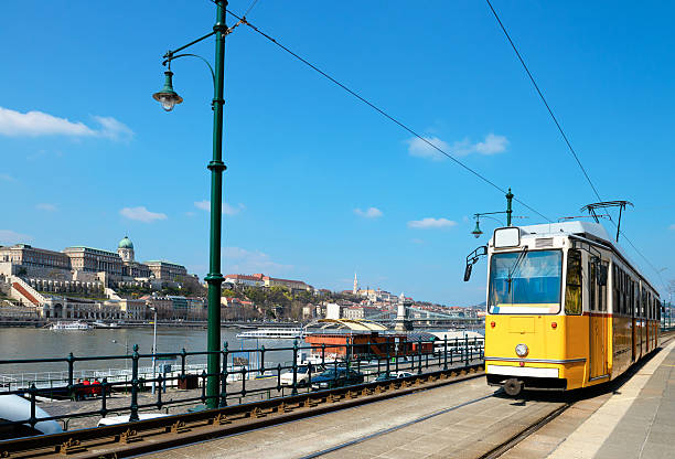 istock Historical tram runs on the riverside in Budapest 478838014