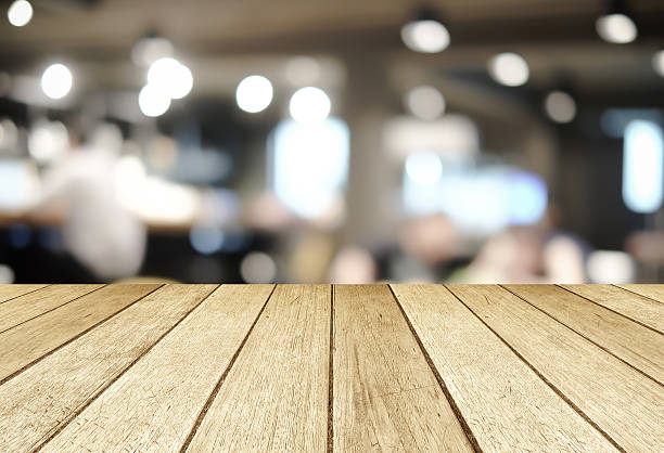 istock Perspective wood over blurred restaurant with bokeh background 478839284