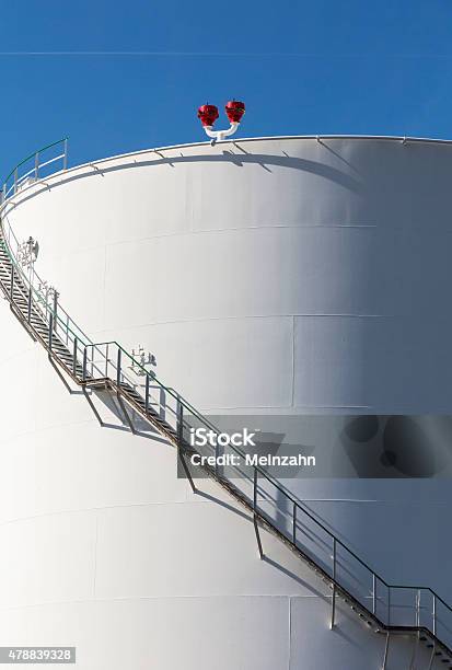 White Tanks In Tank Farm With Iron Staircase Stock Photo - Download Image Now - 2015, Blue, Crude Oil