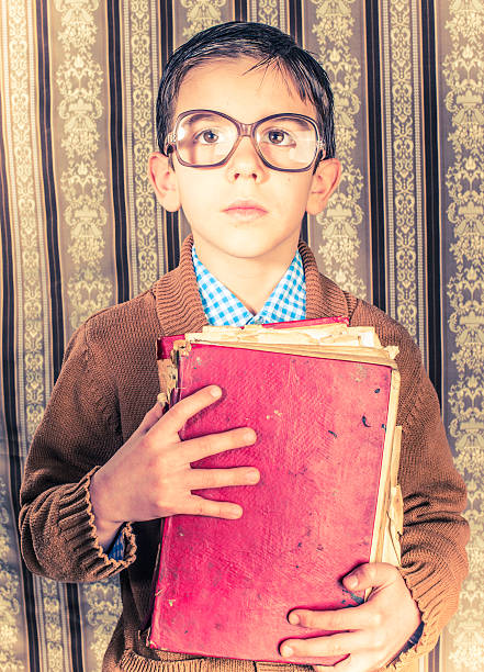 istock Child with red vintage book 478842391