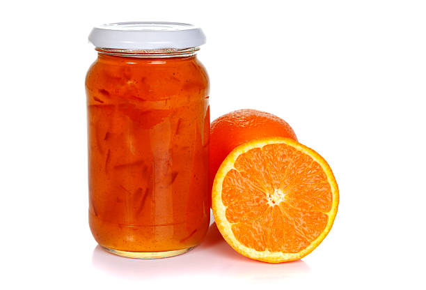 istock Jar of orange marmalade and oranges 478842435