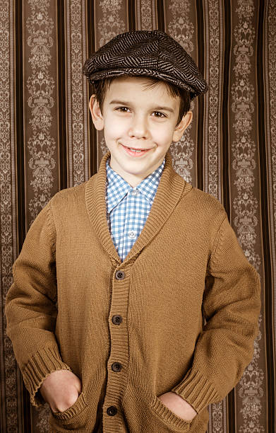 istock Smiling child in vintage clothes and hat 478843007