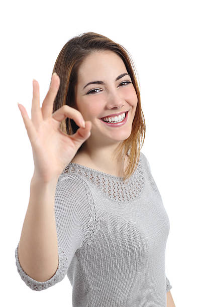 istock Happy woman gesturing ok 478849037