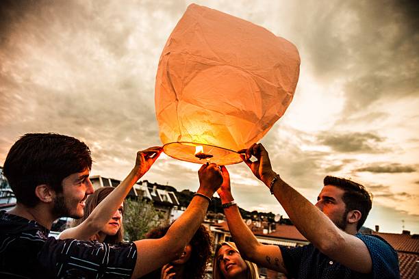 istock Lighting a chinese lantern at birthday party 478849198