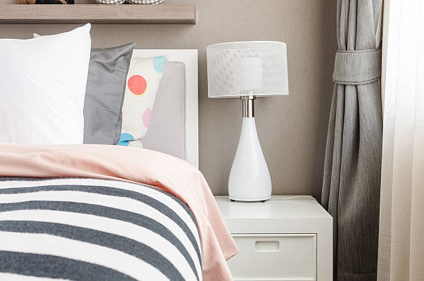 istock kid's bedroom with white pillows and lamp on modern bed 478851434