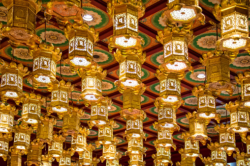 SIngapore, Singapore - May 7, 2015: Interior of the Buddha Tooth Relic Temple, the most famous buddhist temple of Chinatown in Singapore