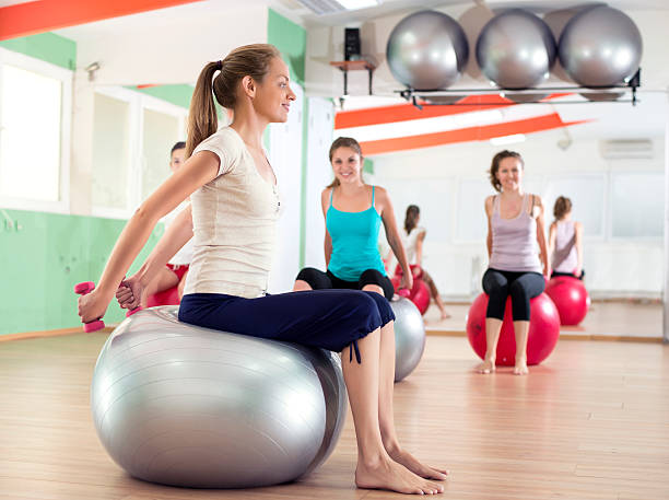 istock Young Women with pilates bal 478852195