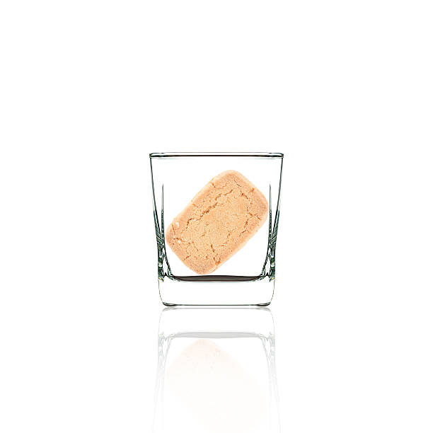 istock glass and butter cookies isolated on white background 478852447