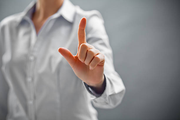 istock Businesswoman touching screen 478854067
