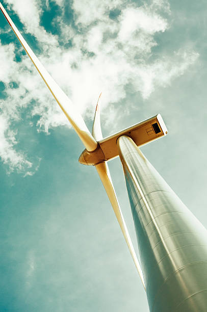 istock Wind turbine with green cloudy sky 478859033