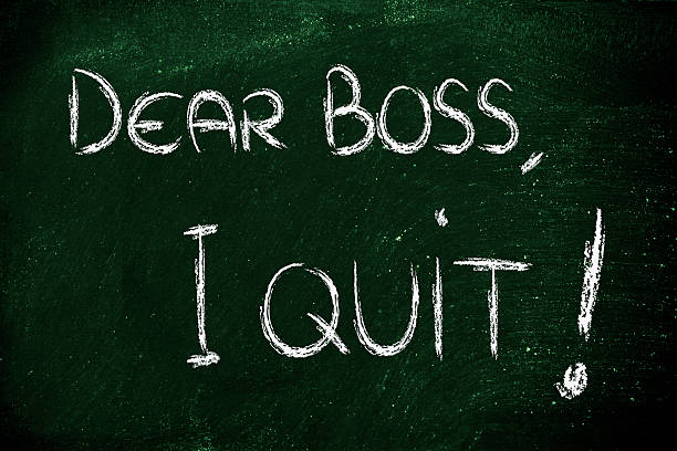 Dear Boss, I quit: unhappy employee message stock photo