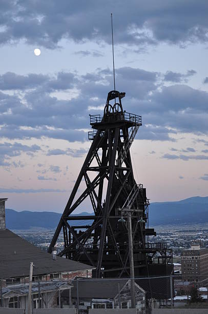 Gallows Frame and Full Moon in Butte, Montana stock photo